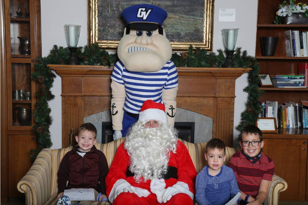 Louie and santa with three boys